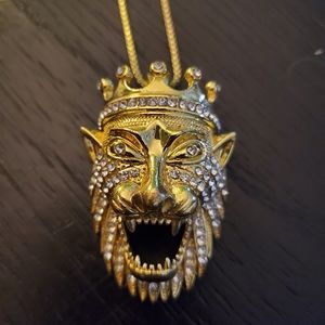 Tiger head pendant and chain.